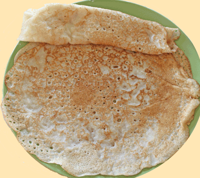 Appau/pancake just out of pan and ready to be eaten